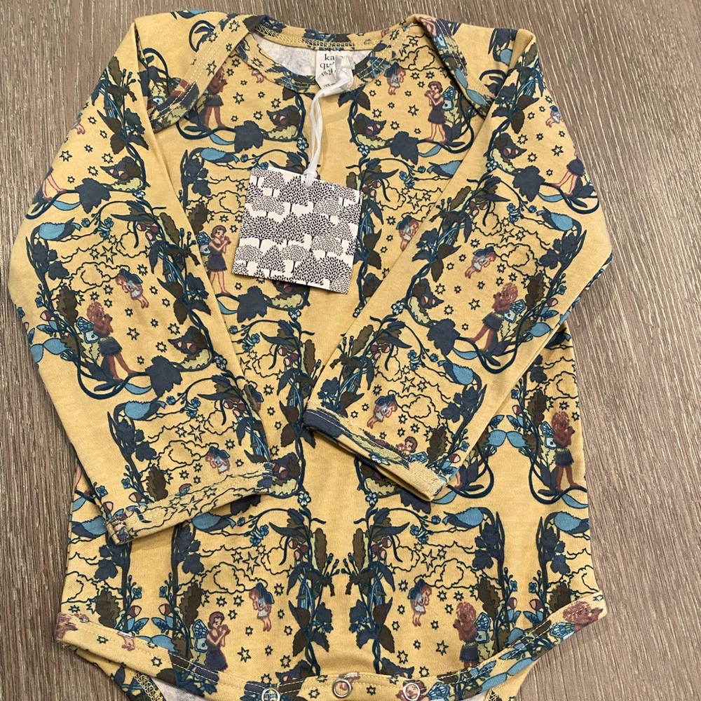 Kate Quinn fairy bodysuit